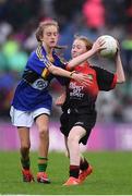 20 August 2017; Jessie McManus of Carrigallen National School, Co Leitrim, representing Mayo, and Carlie O'Donohoe of Moyglass National School, Co Tipperary, representing Kerry, during the INTO Cumann na mBunscol GAA Respect Exhibition Go Games at half time of the GAA Football All-Ireland Senior Championship Semi-Final match between Kerry and Mayo at Croke Park in Dublin. Photo by Stephen McCarthy/Sportsfile