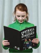 22 August 2017; Keelan O'Donoghue, aged 9, from Killarney Celtic in Killarney, Co. Kerry looks through the Football For All booklet during the Football For All Strategic Plan Launch at the Marker Hotel in Dublin. Photo by David Fitzgerald/Sportsfile