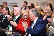 22 August 2017; FAI Chief Executive John Delaney, from right, Tánaiste Frances Fitzgerald TD, and FAI President Tony Fitzgerald applaud speeches during the Football For All Strategic Plan Launch at the Marker Hotel in Dublin.  Photo by Cody Glenn/Sportsfile