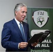22 August 2017; FAI Chief Executive John Delaney reads the Football For All Strategic Plan booklet during the Football For All Strategic Plan Launch at the Marker Hotel in Dublin.  Photo by Cody Glenn/Sportsfile