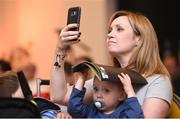 22 August 2017; Vicky Casserly, from Lucan, Co Dublin, takes photographs of the presentation with her son Tom Naughton, age 2, at the Football For All Strategic Plan Launch at the Marker Hotel in Dublin. Photo by Cody Glenn/Sportsfile