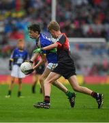 20 August 2017; Paddy Lynch of Bruree National School, Co Limerick, representing Kerry, and Matthew Flynn of Scoil Mhuire National School, Co Longford, representing Mayo, during the INTO Cumann na mBunscol GAA Respect Exhibition Go Games at half time during the GAA Football All-Ireland Senior Championship Semi-Final match between Kerry and Mayo at Croke Park in Dublin. Photo by Ray McManus/Sportsfile