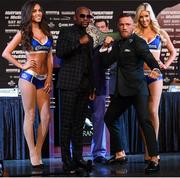 23 August 2017; Conor McGregor and Floyd Mayweather Jr square off during a news conference at the MGM Grand in Las Vegas, USA, ahead of their super welterweight boxing match at T-Mobile Arena in Las Vegas on Saturday August 26. Photo by Stephen McCarthy/Sportsfile