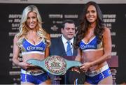 23 August 2017; Promotional girls hold the belt that Conor McGregor and Floyd Mayweather Jr will fight for during a news conference at the MGM Grand in Las Vegas, USA, ahead of their super welterweight boxing match at T-Mobile Arena in Las Vegas on Saturday August 26. Photo by Stephen McCarthy/Sportsfile