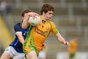20 May 2012; Mark Gallagher, Donegal, in action against Conor Madden, Cavan. Electric Ireland Ulster GAA Football Minor Championship Prelimenary Round, Cavan v Donegal, Kingspan Breffni Park, Cavan. Picture credit: Oliver McVeigh / SPORTSFILE