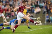20 May 2012; Mark Hehir, Galway, shoots to score his side's first goal, despite the efforts of Geoffrey Claffey, Roscommon. Connacht GAA Football Senior Championship Quarter-Final, Roscommon v Galway, Dr. Hyde Park, Roscommon. Picture credit: Barry Cregg / SPORTSFILE