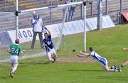 20 May 2012; Waterford goalkeeper Kieran Cotter is unable to stop Limerick's second goal, scored by Ian Ryan. Munster GAA Football Senior Championship Quarter-Final, Limerick v Waterford, Gaelic Grounds, Limerick. Picture credit: Diarmuid Greene / SPORTSFILE