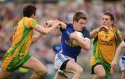 20 May 2012; Thomas Corr, Cavan, in action against Rory Kavanagh and Declan Walsh, Donegal. Ulster GAA Football Senior Championship Preliminary Round, Cavan v Donegal, Kingspan Breffni Park, Cavan. Picture credit: Oliver McVeigh / SPORTSFILE