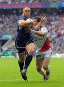 19 May 2012; Heinke Van Der Merwe on his way to scoring his side's fourth try despite the tackle of Craig Gilroy, Ulster. Heineken Cup Final, Leinster v Ulster, Twickenham Stadium, Twickenham, England. Picture credit: Tom Dwyer / SPORTSFILE