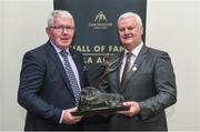 24 August 2017; Uachtarán Chumann Lúthchleas Gael Aogán Ó Fearghail, right, presents former Offaly hurler Padraig Horan with his Hall of Fame award during the GAA Museum Hall of Fame – Announcement of 2017 Inductees event at Croke Park in Dublin. Photo by Matt Browne/Sportsfile