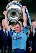 17 September 1995; Charlie Redmond of Dublin lifts the Sam Maguire Cup after the the GAA Football All-Ireland Senior Champtionship Final match between Dublin and Tyrone at Croke Park in Dublin. Photo by Ray McManus/Sportsfile