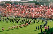 17 September 1995; The Dublin and Tyrone teams as the pass the Canal End during the parade ahead of the GAA Football All-Ireland Senior Champtionship Final match between Dublin and Tyrone at Croke Park in Dublin. Photo by Ray McManus/Sportsfile