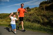 26 August 2017; parkrun Ireland, in partnership with Vhi, added their 66th event on Saturday, August 26th, with the introduction of the Poolbeg parkrun. parkruns take place over a 5km course weekly, are free to enter and are open to all ages and abilities, providing a fun and safe environment to enjoy exercise. To register for a parkrun near you visit www.parkrun.ie. New registrants should select their chosen event as their home location. You will then receive a personal barcode which acts as your free entry to any parkrun event worldwide. Pictured during the Poolbeg parkrun, in partnership with Vhi, are Roman Manley, age 6, and father Niall Manley, from Irishtown, Dublin. Photo by Cody Glenn/Sportsfile