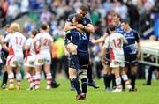19 May 2012; Leinster players  Brian O'Driscoll,13, and Fergus McFadden celebrate after the game. Heineken Cup Final, Leinster v Ulster, Twickenham Stadium, Twickenham, England. Picture credit: Tom Dwyer / SPORTSFILE