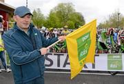 20 May 2012; Dunboyne postman David Hobbs before waving the start flag at the first stage of the 2012 An Post Rás. Dunboyne - Kilkenny. Picture credit: Stephen McCarthy / SPORTSFILE