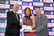 22 May 2012; Linda Martin, Monaghan, is presented with her award for making the Bord Gáis Energy Ladies Gaelic Football Division 1 Team of the League by Ger Cunningham, left, Sports Sponsorship Manager, Bord Gáis Energy, and Pat Quill, President, Ladies Gaelic Football Association. Croke Park, Dublin. Picture credit: Brendan Moran / SPORTSFILE