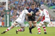 19 May 2012; Cian Healy, Leinster, is tackled by Johann Muller, left, and Dan Tuohy, Ulster. Heineken Cup Final, Leinster v Ulster, Twickenham Stadium, Twickenham, England. Picture credit: Matt Impey / SPORTSFILE