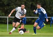 26 August 2017; Dylan Connolly of Dundalk in action against Gerard Rowe of Crumlin United during the Irish Daily Mail FAI Cup Second Round match between Crumlin United and Dundalk at Iveagh Grounds in Drimnagh, Dublin. Photo by Cody Glenn/Sportsfile