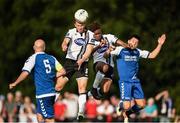 26 August 2017; David McMillan of Dundalk heads the ball on goal supported by team-mate Carlton Ubaezuonu of Dundalk despite the defence of Noel Murray, left, and Alan Barrett of Crumlin United during the Irish Daily Mail FAI Cup Second Round match between Crumlin United and Dundalk at Iveagh Grounds in Drimnagh, Dublin. Photo by Cody Glenn/Sportsfile