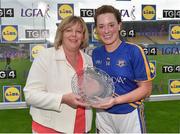 26 August 2017; Gillian O'Brien of Tipperary is presented with her player of the match award by LGFA President Marie Hickey after the TG4 Ladies Football All-Ireland Intermediate Championship Semi-Final match between Meath and Tipperary at Semple Stadium in Thurles, Co. Tipperary. Photo by Matt Browne/Sportsfile
