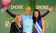 25 May 2012; Krister Hagen, Norway Oneco- Mesterhus, is presented with the One Direct stage winners jersey by Alison Hennessy, One Direct, Business Development Manager, and Miss An Post Rás Killybegs Ailbhe Cunningham following the sixth stage of the 2012 An Post Rás. Buncrana - Killybegs. Picture credit: Stephen McCarthy / SPORTSFILE