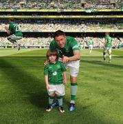 26 May 2012; Republic of Ireland captain Robbie Keane with his son, Robbie junior, ahead of the game. Senior International Friendly, Republic of Ireland v Bosnia & Herzegovina, Aviva Stadium, Lansdowne Road, Dublin. Picture credit: David Maher / SPORTSFILE