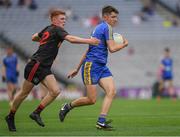 27 August 2017; Ciarán Lawless of Roscommon in action against Daniel Miller of Tyrone during the All-Ireland U17 Football Championship Final match between Tyrone and Roscommon at Croke Park in Dublin. Photo by Ray McManus/Sportsfile