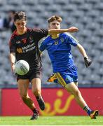 27 August 2017; Darragh Canavan of Tyrone kicks a point despite the attentions of Paul McGrath of Roscommon during the All-Ireland U17 Football Championship Final match between Tyrone and Roscommon at Croke Park in Dublin. Photo by Brendan Moran/Sportsfile