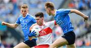 27 August 2017; Simon McErlain of Derry in action against Daniel Brennan, left, and David Lace of Dublin during the Electric Ireland GAA Football All-Ireland Minor Championship Semi-Final match between Dublin and Derry at Croke Park in Dublin. Photo by Ramsey Cardy/Sportsfile