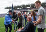 27 August 2017; Dublin manager Jim Gavin shakes hands with Tyrone manager Mickey Harte, alongside former Antrim footballer Anto Finnegan and his children Conall and Ava ahead of the GAA Football All-Ireland Senior Championship Semi-Final match between Dublin and Tyrone at Croke Park in Dublin. Photo by Ramsey Cardy/Sportsfile