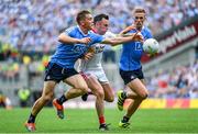 27 August 2017; Cathal McCarron of Tyrone is tackled by Con O'Callaghan, left, and Paul Mannion of Dublin during the GAA Football All-Ireland Senior Championship Semi-Final match between Dublin and Tyrone at Croke Park in Dublin. Photo by Ramsey Cardy/Sportsfile