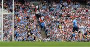 27 August 2017; Eoghan O'Gara of Dublin palms the ball to the net past Tyrone goalkeeper Niall Morgan for his side's second goal during the GAA Football All-Ireland Senior Championship Semi-Final match between Dublin and Tyrone at Croke Park in Dublin. Photo by Piaras Ó Mídheach/Sportsfile