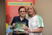 26 May 2012; Diane Mitchell, from Dunlavin, Co. Wicklow, is presented with an FAI International Cap after representing the Republic of Ireland in the 2010 Special Olympics European Games by Olivia O'Toole, herself a Republic of Ireland star, during the 2012 Special Olympics Ireland AGM. Red Cow Moran Hotel, Naas Road, Dublin. Picture credit: Ray McManus / SPORTSFILE