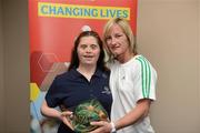 26 May 2012; Andrea Buckley, from Summerhill, Co. Meath, is presented with an FAI International Cap after representing the Republic of Ireland in the 2010 Special Olympics European Games by Olivia O'Toole, herself a Republic of Ireland star, during the 2012 Special Olympics Ireland AGM. Red Cow Moran Hotel, Naas Road, Dublin. Picture credit: Ray McManus / SPORTSFILE