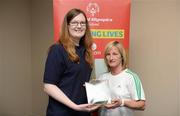 26 May 2012; Siobhan Dunne, from Strabane, Co. Tyrone, is presented with an FAI International Cap after representing the Republic of Ireland in the 2010 Special Olympics European Games by Olivia O'Toole, herself a Republic of Ireland star, during the 2012 Special Olympics Ireland AGM. Red Cow Moran Hotel, Naas Road, Dublin. Picture credit: Ray McManus / SPORTSFILE