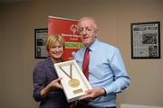 26 May 2012; Mary Davis, Chairperson, Special Olympics Ireland, makes a presentation to former Assistant Commissioner of An Garda Siochana Mick Feehan during the 2012 Special Olympics Ireland AGM. Red Cow Moran Hotel, Naas Road, Dublin. Picture credit: Ray McManus / SPORTSFILE