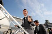 27 May 2012; Pictured is Republic of Ireland captain Robbie Keane boarding a plane with the Republic of Ireland squad, proudly sponsored by Three, as they depart for Italy where they will train ahead of the finals in Poland. Dublin Airport, Dublin. Picture credit: David Maher / SPORTSFILE