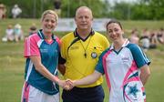 26 May 2012; Team captains Juliet Murphy, left, Cork and 2011 All Stars, shakes hands with Denise Masterson, Dublin and 2010 All Stars, in the company of referee Keith Delahunty before the game. 2012 TG4/O'Neills Ladies All-Star Tour Exhibition Game, 2010 All Stars v 2011 All Stars, Centennial Park, Toronto, Canada. Picture credit: Brendan Moran / SPORTSFILE
