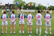 26 May 2012; Players on the 2010 All Stars team, from left, Sinead McLaughlin, Tyrone, Siobhan McGrath, Dublin, Brid Stack, Cork, Gemma Fay, Dublin, Tracey Lawlor, Laois, and Cathy Donnelly, Tyrone, stand for the National Anthems before the game. 2012 TG4/O'Neills Ladies All-Star Tour Exhibition Game, 2010 All Stars v 2011 All Stars, Centennial Park, Toronto, Canada. Picture credit: Brendan Moran / SPORTSFILE