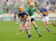 27 May 2012; Padraic Maher, Tipperary, in action against David Breen, Limerick. Munster GAA Hurling Senior Championship Quarter Final, Tipperary v Limerick, Semple Stadium, Thurles, Co. Tipperary. Picture credit: Barry Cregg / SPORTSFILE
