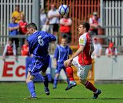 27 May 2012; Paul McCabe, Crumlin United, in action against John Russell, St. Patrick's Athletic. FAI Ford Cup Second Round, Crumlin United v St. Patrick's Athletic, Richmond Park, Dublin. Picture credit: Tomas Greally / SPORTSFILE