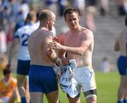 27 May 2012; Dick Clerkin, Monaghan, and Michael McCann, Antrim, right, swap jerseys at the end of the game. Ulster GAA Football  Senior Championship Quarter Final, Monaghan v Antrim, St Tiernach's Park, Clones, Co. Monaghan. Picture credit: Oliver McVeigh / SPORTSFILE