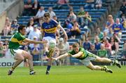 27 May 2012; Michael Quinlivan, Tipperary, in action against Anthony Maher, left, and Peter Crowley, Kerry. Munster GAA Football Senior Championship Quarter-Final, Tipperary v Kerry, Semple Stadium, Thurles, Co. Tipperary. Picture credit: Barry Cregg / SPORTSFILE