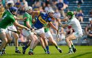 27 May 2012; Patrick Maher, Tipperary, in action against, from left, Wayne Mcnamara, Brian Geary, Tom Condon, Dónal O'Grady and Nickie Quaid, Limerick. Munster GAA Hurling Senior Championship, Tipperary v Limerick, Semple Stadium, Thurles, Co. Tipperary. Picture credit: Barry Cregg / SPORTSFILE
