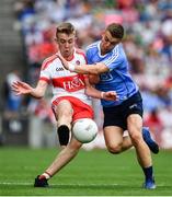 27 August 2017; Oisín McWilliams of Derry is tackled by Neil Matthews of Dublin during the Electric Ireland GAA Football All-Ireland Minor Championship Semi-Final match between Dublin and Derry at Croke Park in Dublin. Photo by Ramsey Cardy/Sportsfile
