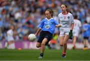 27 August 2017; Meabh Fee of St. Oliver Plunkett NS Co Louth, representing Dublin, in action against Olivia McGuinness of Edendork PS, Co Tyrone, representing Tyrone, during the INTO Cumann na mBunscol GAA Respect Exhibition Go Games at Dublin v Tyrone - GAA Football All-Ireland Senior Championship Semi-Final at Croke Park in Dublin. Photo by Brendan Moran/Sportsfile