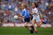 27 August 2017; Orlaith Craven of Ardnagrath NS, Co Westmeath, representing Dublin, in action against Olivia McGuinness of Edendork PS, Co Tyrone, representing Tyrone, during the INTO Cumann na mBunscol GAA Respect Exhibition Go Games at Dublin v Tyrone - GAA Football All-Ireland Senior Championship Semi-Final at Croke Park in Dublin. Photo by Brendan Moran/Sportsfile