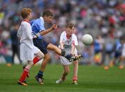 26 August 2017; Conor Sheerin of Milltown NS, Co Kildare, representing Dublin, Conal McGlinchey of St Oliver’s PS, Co Armagh, representing Tyrone, and Ross Shields of Scoil Mhuire NS, Co Longford, representing Tyrone, during the INTO Cumann na mBunscol GAA Respect Exhibition Go Games at Dublin v Tyrone - GAA Football All-Ireland Senior Championship Semi-Final at Croke Park in Dublin. Photo by Ray McManus/Sportsfile