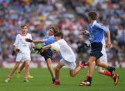 26 August 2017; Callum Clarke of St Coens NS, Co Wicklow, representing Dublin, and Rory Smyth of St Patrick’s PS, Co Fermanagh, representing Tyrone, during the INTO Cumann na mBunscol GAA Respect Exhibition Go Games at Dublin v Tyrone - GAA Football All-Ireland Senior Championship Semi-Final at Croke Park in Dublin. Photo by Ray McManus/Sportsfile