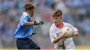 27 August 2017; Danny Diver of St Patricks, Co Donegal, representing Tyrone, in action against Jack Slevin of St. Mary’s NS, Co Offaly, representing Dublin, during the INTO Cumann na mBunscol GAA Respect Exhibition Go Games at Dublin v Tyrone - GAA Football All-Ireland Senior Championship Semi-Final at Croke Park in Dublin. Photo by Piaras Ó Mídheach/Sportsfile